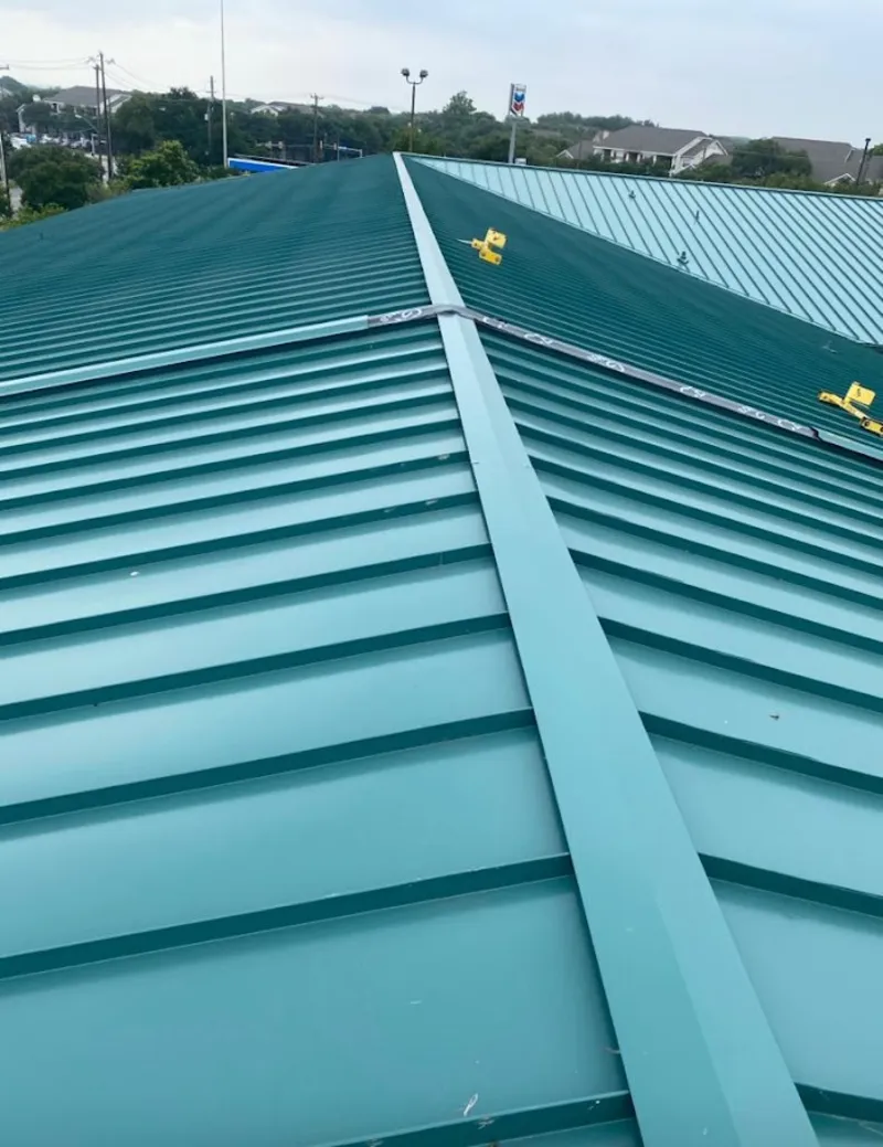 Green commercial metal roof ridge and valley for Metal Roof Repair in American Falls